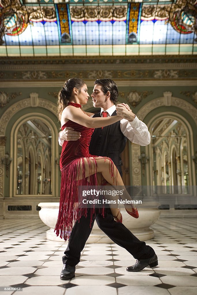 Young couple tango dancing 