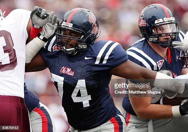 Michael Oher of the Ole Miss Rebels blocks against the Mississippi State Bulldogs during the game at Vaught-Hemingway Stadium on November 28, 2008 in...