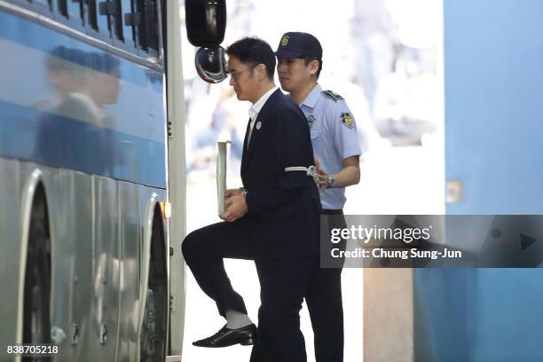 Lee Jae-yong, vice chairman of Samsung Electronics Co., leave after his verdict trial at the Seoul Central District Court on August 25, 2017 in...