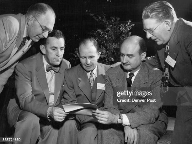 Leaders of the Colorado Press association are shown at opening session of the group's convention in Denver. Left to right are Bill Long, secretary;...
