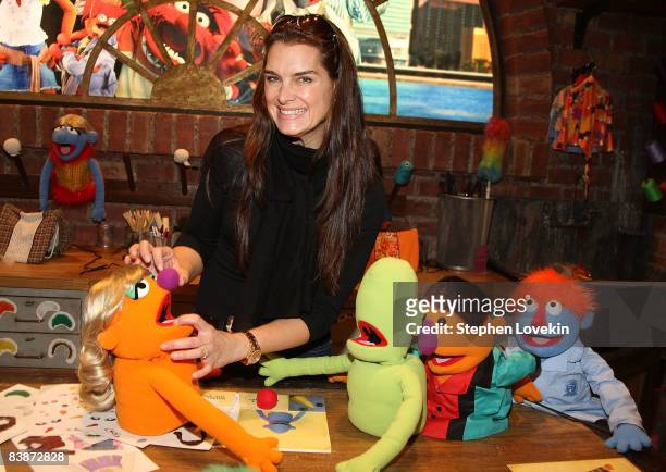 Actress Brooke Shields visits the Muppet Whatnot Workshop at FAO Schwartz on December 1, 2008 in New York City.