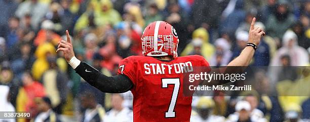 Quarterback Matthew Stafford of the Georgia Bulldogs calls a play during the game against the Georgia Tech Yellow Jackets at Sanford Stadium on...