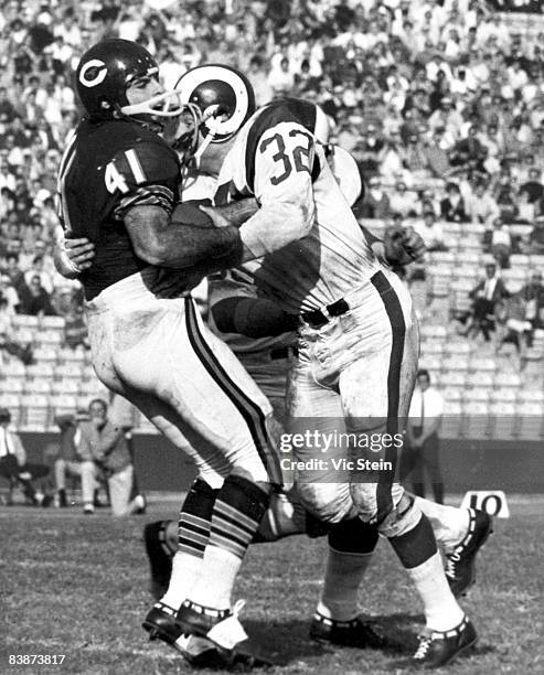 Chicago Bears running back Brian Piccolo takes a jarring hit from Rams linebacker Jack Pardee during the Bears 17-16 victory over the Los Angeles...