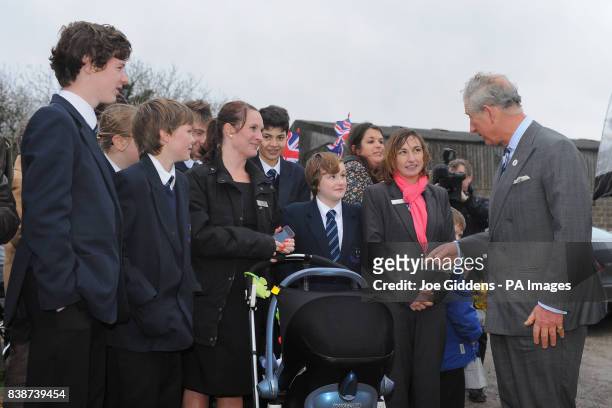 The Prince of Wales meets Louise Marsh and other locals at the Cholmeley Arms as part of the Pub is The Hub initiative, Burton Lane,...