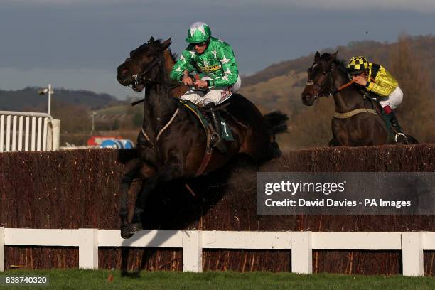 Astracad ridden by Jockey Sam Twiston-Davies jumps in the Jenny Mould Memorial Handicap Chase