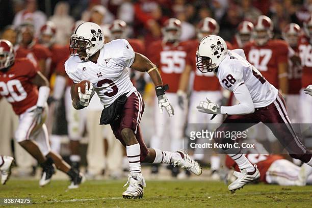 Derek Pegues of the Mississippi State Bulldogs carries the ball during the game against the Alabama Crimson Tide at Bryant-Denny Stadium on November...