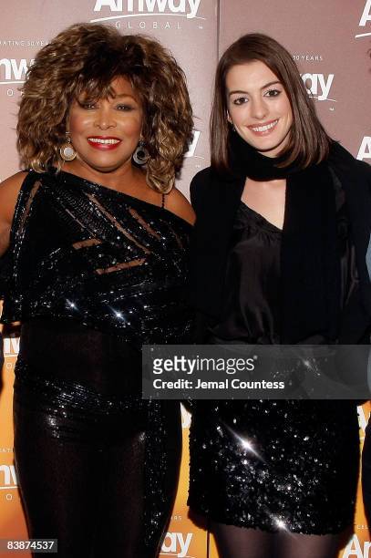 Singer and music legend Tina Turner and actress Anne Hathaway attend the Amway Global presentation of Tina Turner Live in Concert at Madison Square...