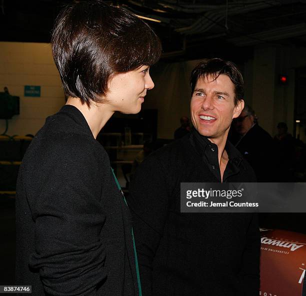 Actress Katie Holmes and actor Tom Cruise backstage at the Amway Global presentation of Tina Turner Live in Concert at Madison Square Garden on...