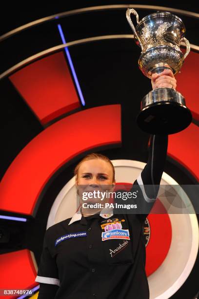 Russia's Anastasia Dobromyslova celebrates beating England's Deta Hedman to win the Women's BDO World Professional Darts Championships at the...