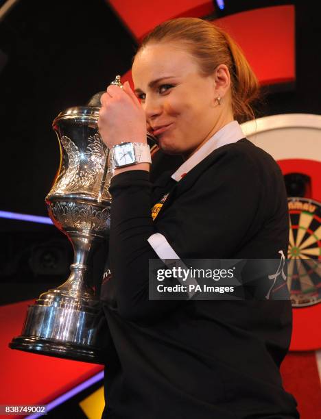 Russia's Anastasia Dobromyslova celebrates beating England's Deta Hedman to win the Women's BDO World Professional Darts Championships at the...