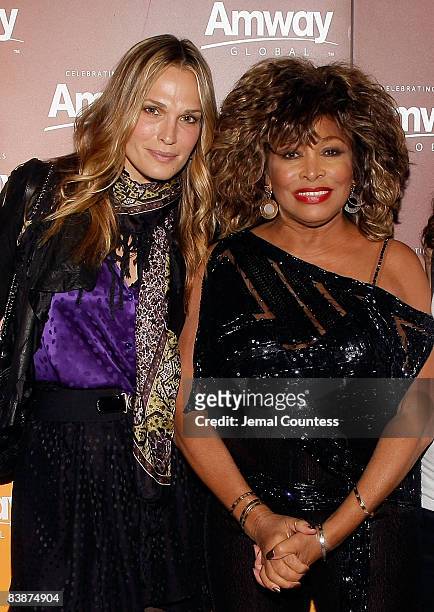 Actress and model Molly Sims and Singer/music legend Tina Turner backstage at the Amway Global presentation of Tina Turner Live in Concert at Madison...