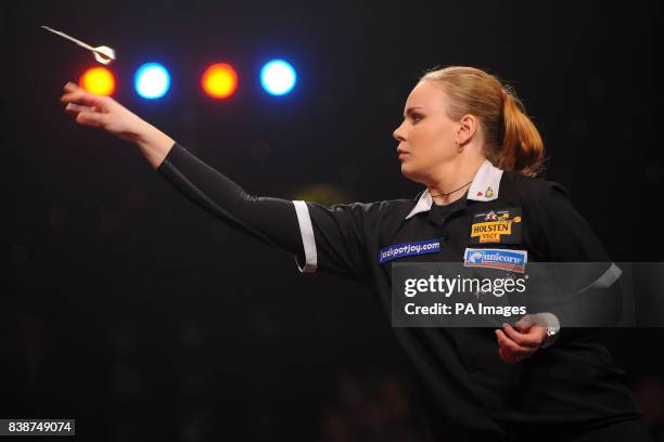 Russia's Anastasia Dobromyslova in action in the final of the Women's BDO World Professional Darts Championships at the Lakeside Complex, Surrey.