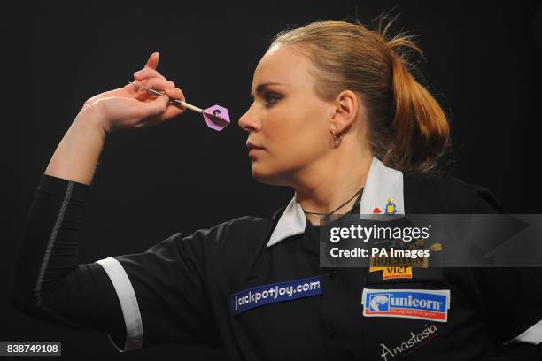 Russia's Anastasia Dobromyslova in action in the Women's BDO World Professional Darts Championships at the Lakeside Complex, Surrey.