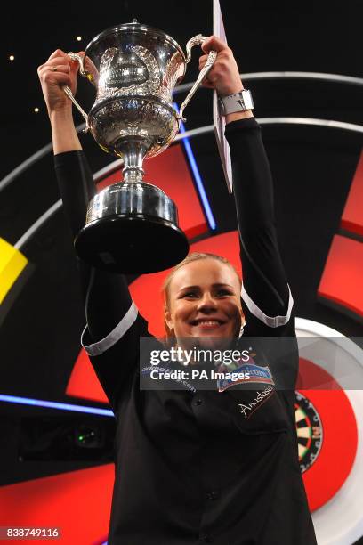 Russia's Anastasia Dobromyslova celebrates beating England's Deta Hedman to win the Women's BDO World Professional Darts Championships at the...