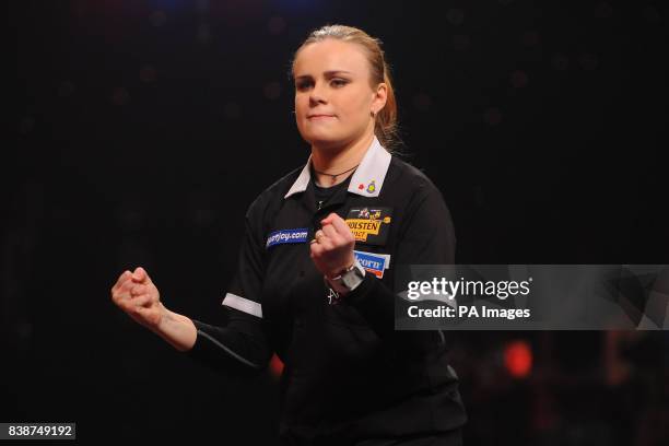 Russia's Anastasia Dobromyslova celebrates beating England's Deta Hedman to win the Women's BDO World Professional Darts Championships at the...