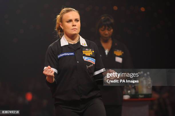 Russia's Anastasia Dobromyslova celebrates beating England's Deta Hedman to win the Women's BDO World Professional Darts Championships at the...