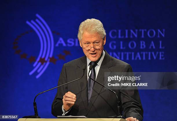 Former US president Bill Clinton speaks at the Clinton Global Initiative in Hong Kong on December 2, 2008. The intiative brings together global...