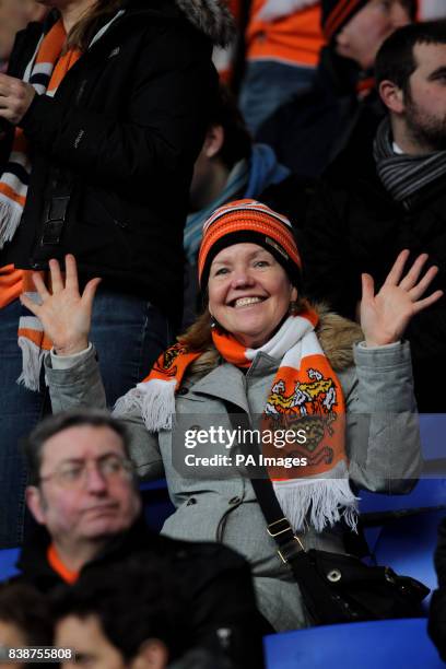 Travelling Blackpool fans watch from the stands during the npower Championship match at Portman Road, Ipswich.
