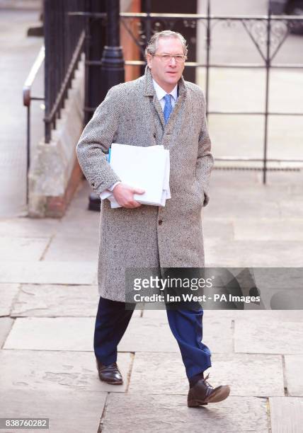 John Witherow, editor of The Sunday Times arrives at the Leveson enquiry at the Royal Courts of Justice in London.