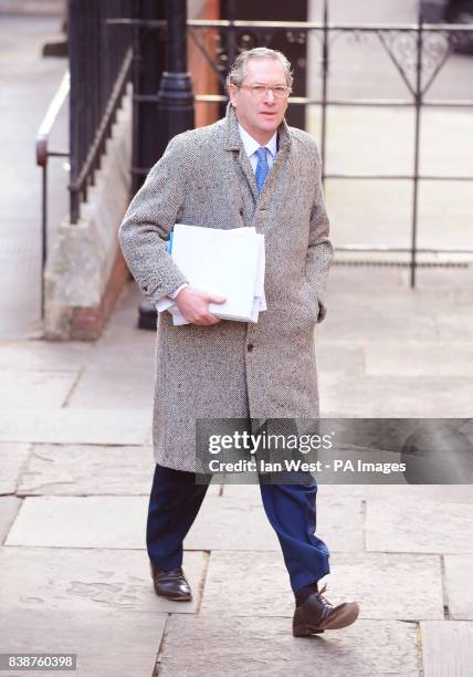 John Witherow, editor of The Sunday Times arrives at the Leveson enquiry at the Royal Courts of Justice in London.