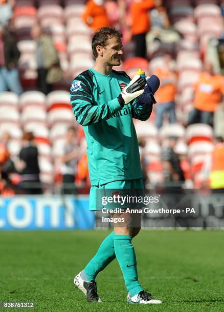 Arsenal goalkeeper Jens Lehmann celebrates victory after the final whistle