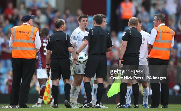 Newcastle United's Joey Barton speaks to referee Stuart Attwell after the final whistle