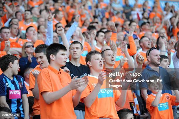 Blackpool fans cheer on their side in the stands