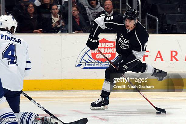 Brad Richardson of the Los Angeles Kings passes the puck against the Toronto Maple Leafs during the game on December 1, 2008 at Staples Center in Los...