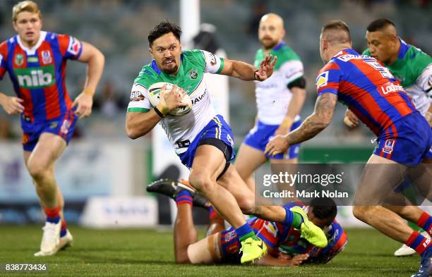 Jordan Rapana of the Raiders runs the ball during the round 25 NRL match between the Canberra Raiders and the Newcastle Knights at GIO Stadium on...