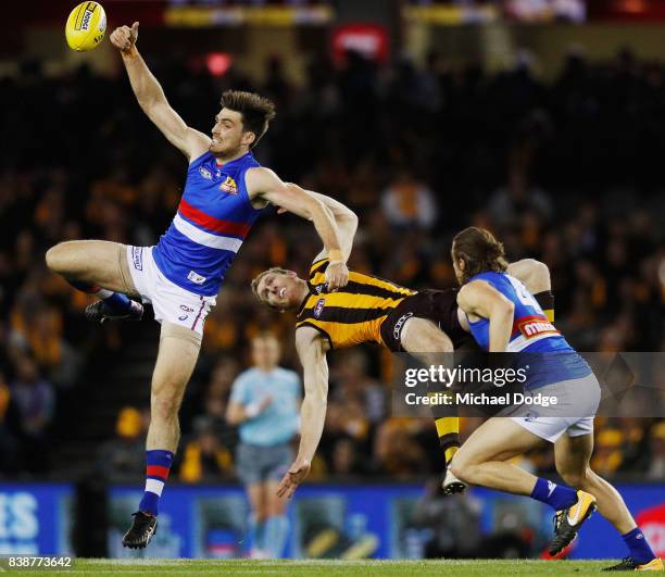 Tom Campbell of the Bulldogs wins the tap against Ben McEvoy of the Hawks during round 23 AFL match between the Hawthorn Hawks and the Western...