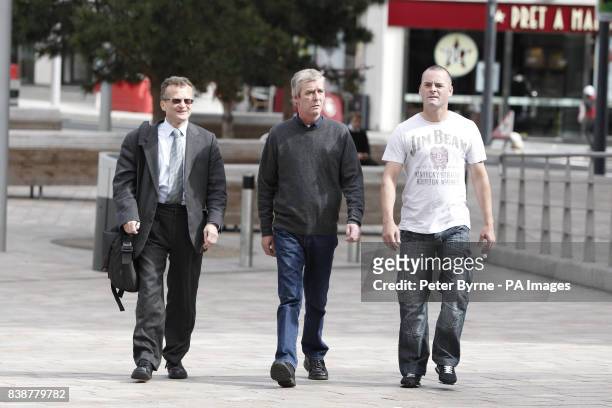 Solicitor Robin Makin, Jimmy Bulger and Ralph Bulger, the uncle of father of James Bulger, arrive at Liverpool Crown Court to make a victim personal...