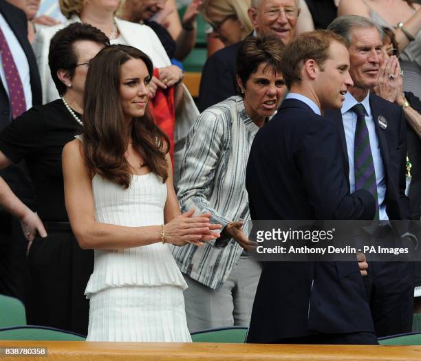 The Duke and Duchess of Cambridge in the Royal Box with Ilana Kloss on Centre Court during day seven of the 2011 Wimbledon Championships at the All...