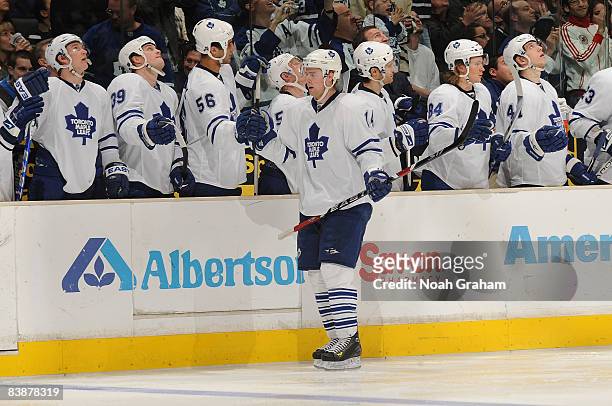 Matt Stajan of the Toronto Maple Leafs celebrates his third period goal with his teammates against the Los Angeles Kings during the game on December...