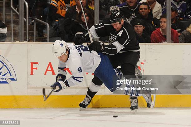 Niklas Hagman of the Toronto Maple Leafs collides with Matt Greene of the Los Angeles Kings during the game on December 1, 2008 at Staples Center in...