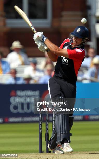 England captain Alastair Cook miss hooks a delivery from Sri Lanka's Lasith Malinga during the Natwest third One Day International at Lords, London.