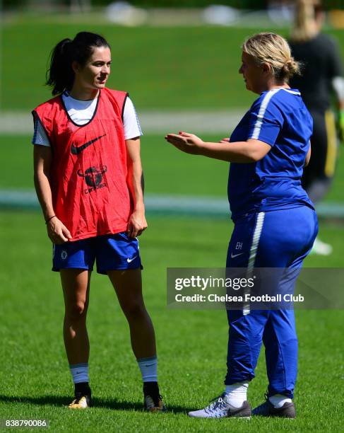 Karen Carmey talks with Emma Hayes, manager of Chelsea during a training session on August 25, 2017 in Schladming, Austria.