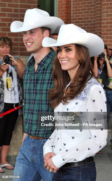 The Duke and Duchess of Cambridge leave the BMO Centre after a Rodeo reception, in Calgary, Alberta, Canada.