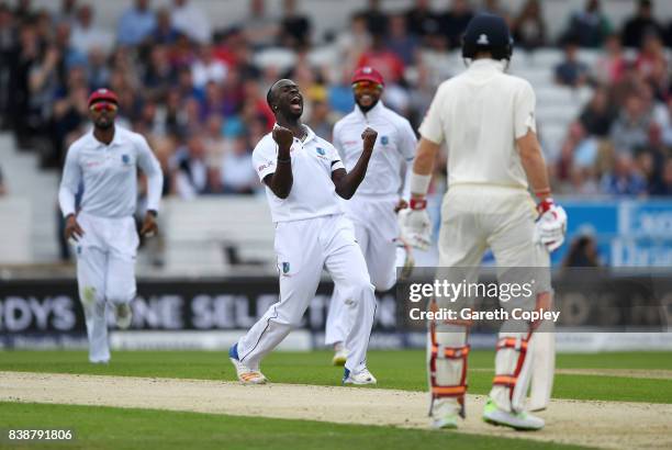 Kemar Roach of the West Indies celebrates dismissing Mark Stoneman of England during day one of the 2nd Investec Test between England and the West...