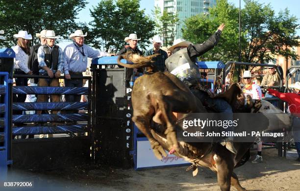 The Duke and Duchess of Cambridge watch a rodeo demonstration at the BMO Centre in Calgary, Alberta, Canada.