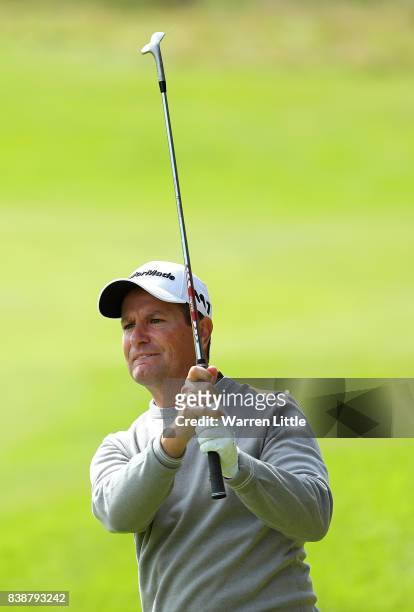 Steve Webster of England hits his second shot on the 18th hole during day two of Made in Denmark at Himmerland Golf & Spa Resort on August 25, 2017...