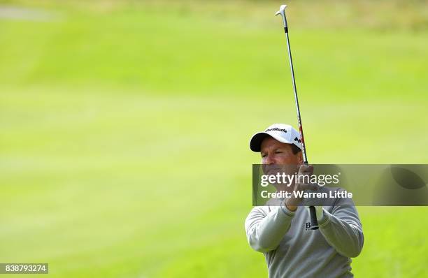 Steve Webster of England hits his second shot on the 18th hole during day two of Made in Denmark at Himmerland Golf & Spa Resort on August 25, 2017...