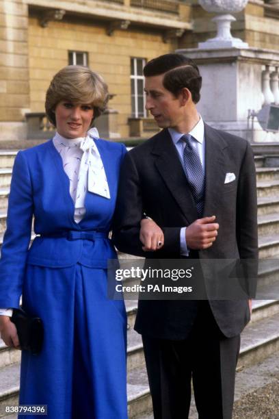 Prince Charles and Lady Diana Spencer looking affectionate in the grounds of Buckingham Palace after the announcement of their engagement in London...
