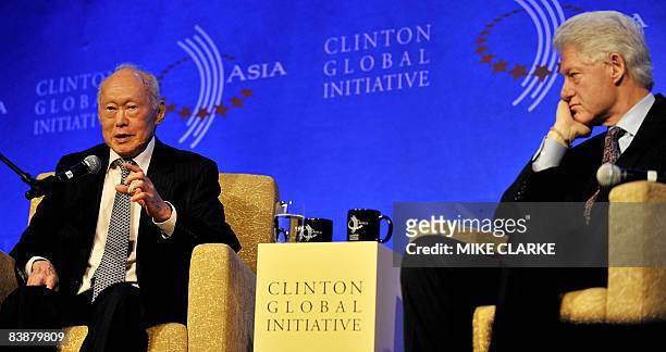 Singapore Minister Mentor LeeKuan Yew and former US president Bill Clinton take part in the Clinton Global Initiative in Hong Kong on December 2,...