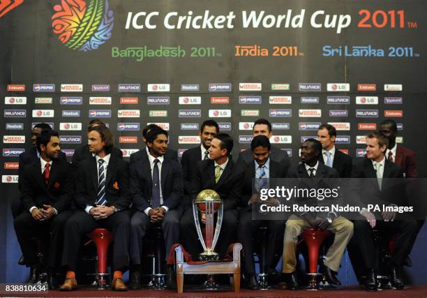 Back Row, Left to Right: Elton Chigumbura , Daniel Vettori , Shahid Afridi , MS Dhoni , Graeme Smith , Andrew Strauss , and Darren Sammy , Front Row:...