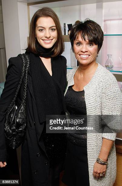Actress Anne Hathaway and Beauty Brand Managing Director for Amway Barb Alviar attends the Amway Global presentation of Tina Turner Live in Concert...