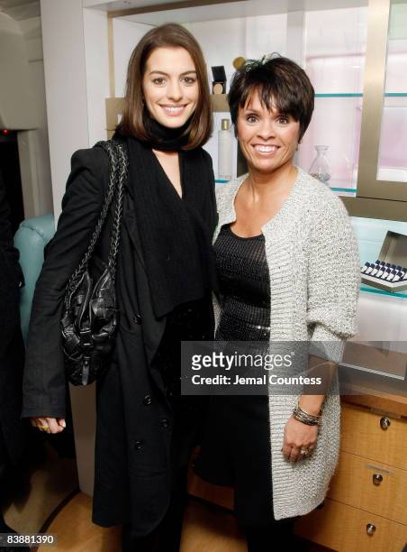 Actress Anne Hathaway and Beauty Brand Managing Director for Amway Barb Alviar attends the Amway Global presentation of Tina Turner Live in Concert...