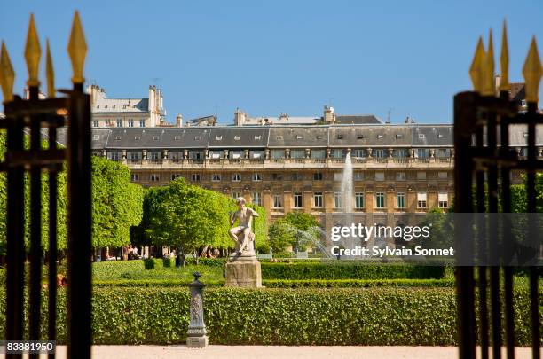 palais royal gardens,  paris, france - formal garden gate stock pictures, royalty-free photos & images