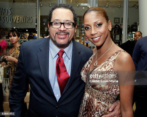 Professor Michael Eric Dyson and actress Holly Robinson Peete attend the "Arriving in Style" trunk show presented by Lexus at the Ronald Reagan...