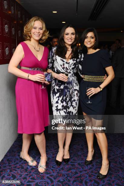 Daybreak team Kirsty McCabe, Grainne Seoige, and Lucy Verasamy arrive for the TRIC Awards held at the Grosvenor Hotel in London.