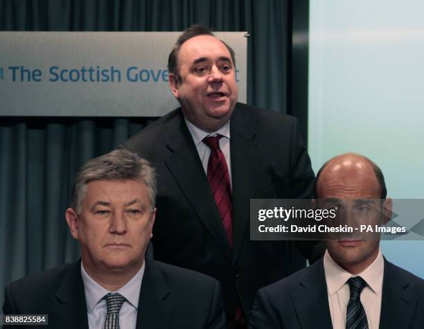 Celtic chief executive Peter Lawwell Rangers chief executive Martin Bain and First Minister Alex Salmond during the Scottish Football Summit in St...